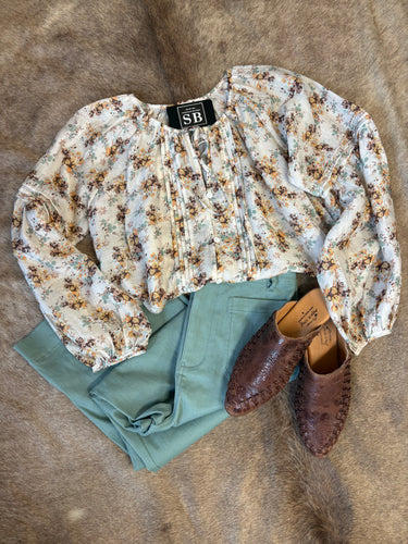 Lightweight floral blouse with tie neckline and pintuck details, true to size, perfect for fall transition.