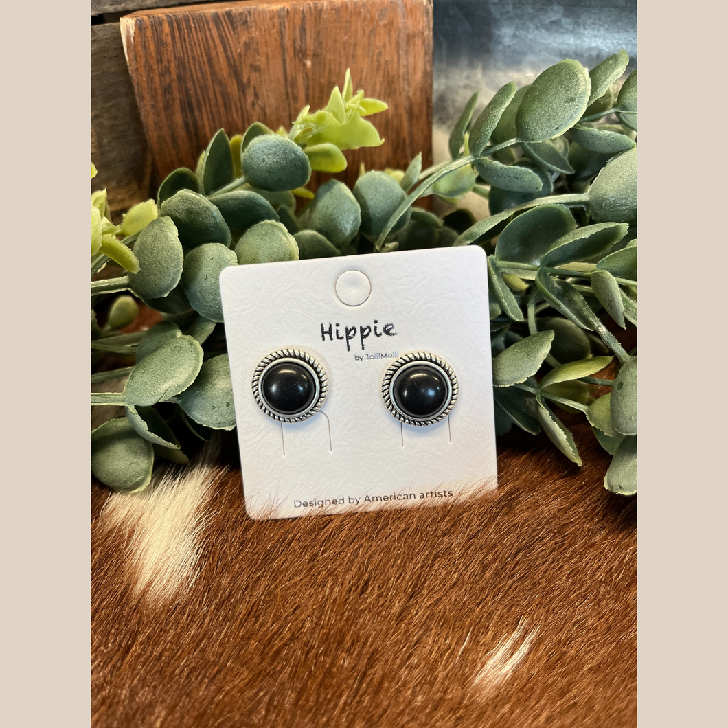 Pair of round stud earrings with black stone centers.