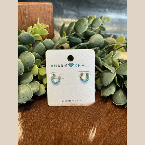 Pair of small horseshoe stud earrings with turquoise stones.