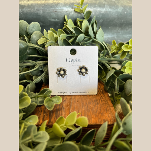 Pair of small western flower stud earrings with white stone centers.
