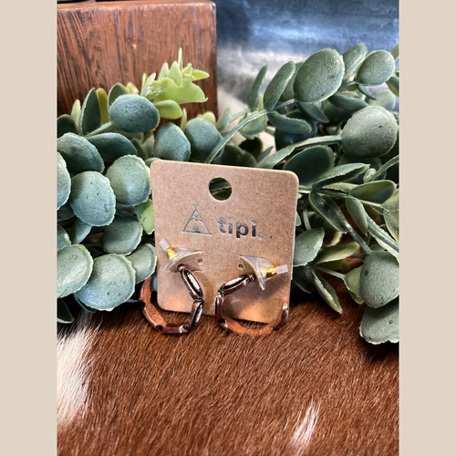 Pair of copper semi-hoop earrings with white stone accents.